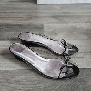 Stuart Weitzman Clear PVC and Black Bow Mule Sandals